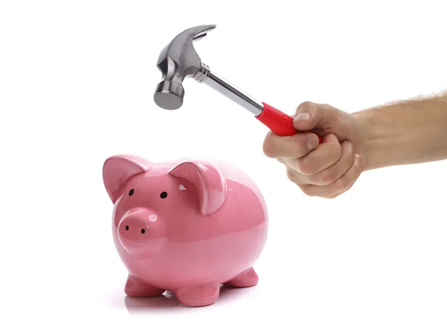 breaking open the piggy bank to pay for your wedding